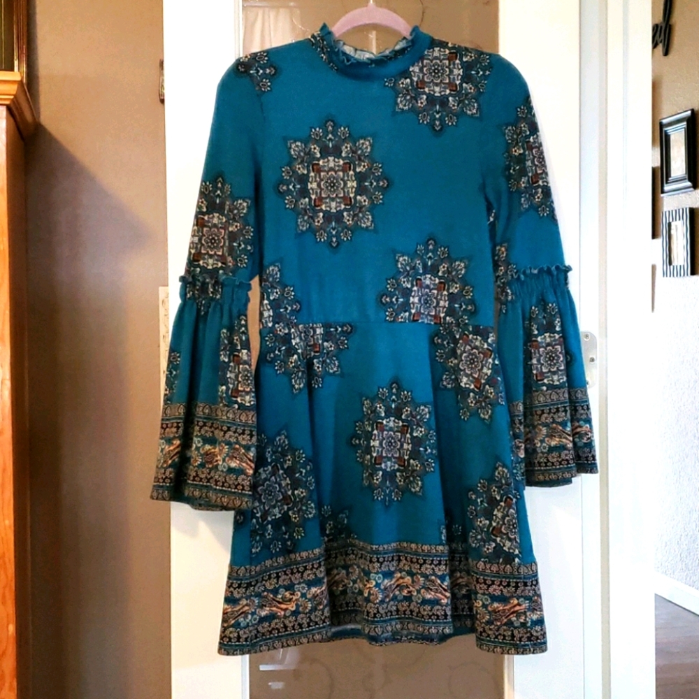 Unique bell sleeve medallion dress